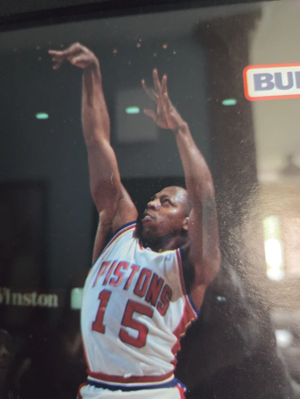 Framed display feat a vintage action photo of Detroit Pistons Vinnie Johnson